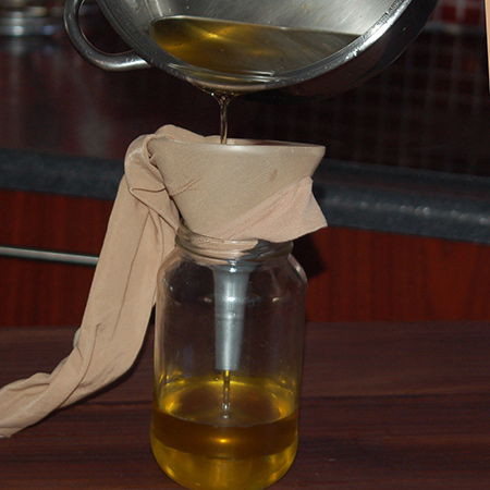 All you need to filter cooking oil is a funnel, an old stocking and a recycled glass jar. Don't store in the fridge, but place in a cupboard or pantry until next use.&nbsp;