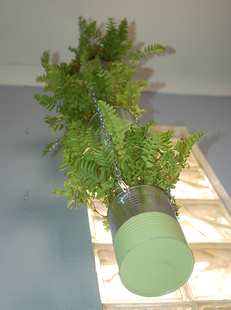  I can up with the idea of using aluminum coffee cans, of which I have plenty, to make a hanging plant holder.