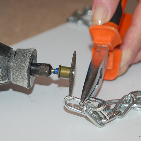 GOOD TO KNOW: If you need to cut  the chain to length use a pair of pliers to hold the chain firmly and cut with a Dremel MultiTool and cutting disk. 