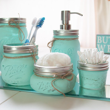 Use assorted sizes of jars to make your own bathroom decor