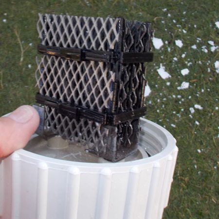 The homemade pressure washer removed the deposits without damaging the cathode and anode electrodes
