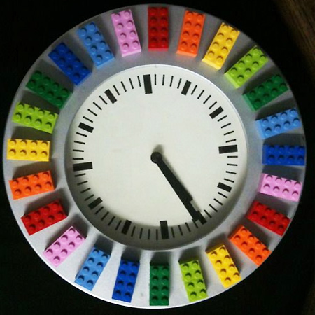 Dress up a plain wall clock with colourful lego blocks.
