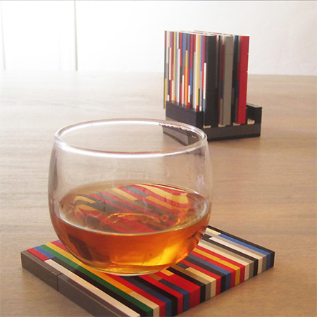 Slim lego blocks are joined together to make bright coasters.