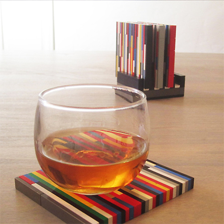 Slim lego blocks are joined together to make bright coasters.