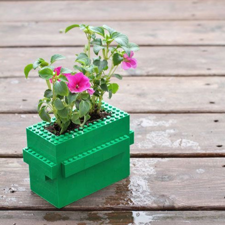 Small blocks can be used to make plant containers. Use blocks of different colours for a colourful display.
