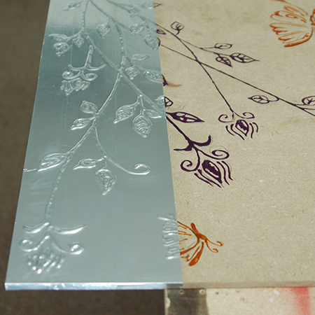 Faux pewter wall art