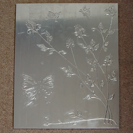 Faux pewter wall art