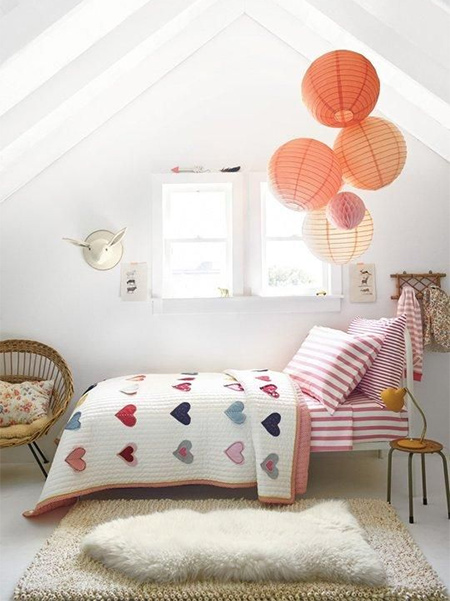 chinese paper lanterns add interest and colour to a child's bedroom