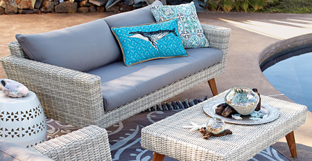 Make an outdoor space feel more homey with a coordinating mat or rug. These shouldn't be kept outdoors, unless under cover