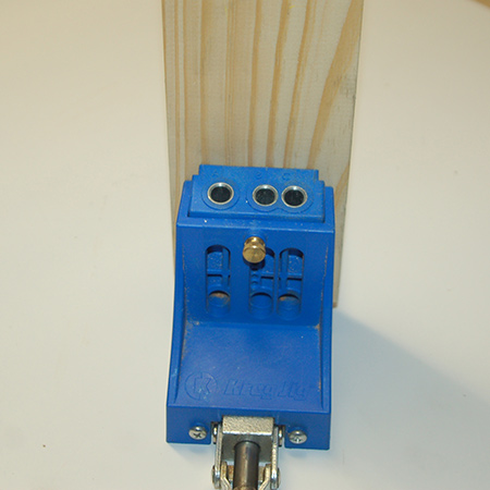 When drilling pocketholes in the end of a piece of timber of board, remove any debris from the clamping system so that the piece sits firmly on top of the clamping system base. Align the piece so that it is lined up where you want to drill holes.