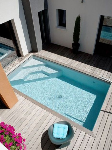 Artificial turf is perfect for an area where children also need space to play, while a more solid surface is easy to maintain if you do lots of outdoor entertaining.