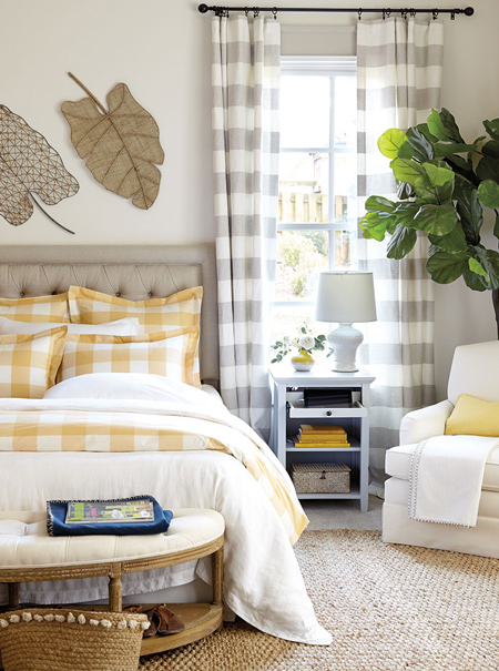 The last design features simplicity at its best. Bedding in a happy yellow hue is mixed with luxuriously soft white linen duvet and shams and give the room a relaxing country feel.