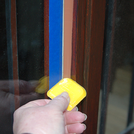 Use a profile to gently - and slowly - run over the top of the sealer to even out and push down into the gap between the glass and the frame. This gives a professional finishing touch to the finished edge.