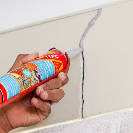 How to fix small cracks in walls