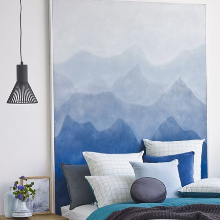 If your guest bedroom is looking a little lacklustre, adding an eyecatching headboard will make all the difference.