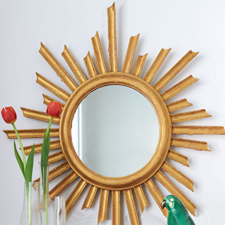 Here's a quick and easy way to turn a circular, framed mirror into a faux gilded sunburst mirror.