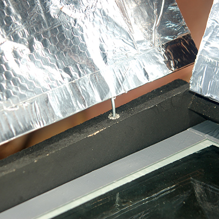 7. Wrap the panels with aluminium roofing tape.