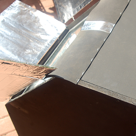 9. At the top of the box oven there was a substantial gap and I used a strip of rubber mat to cover this and ensure no heat loss. The rubber strip was stapled to the top of the box oven. Note: I purchased the rubber mat at a fabric store.