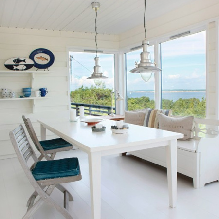 Metallic silver accents lend a sophisticated air to all-white rooms
