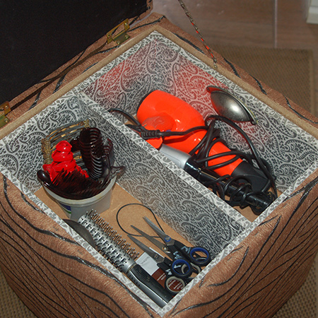 upholstered storage ottoman for hair styling equipment