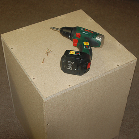 Upholstered ottoman finished