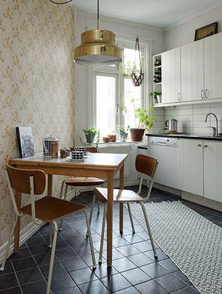 While lighter floors work well in a closed-off kitchen