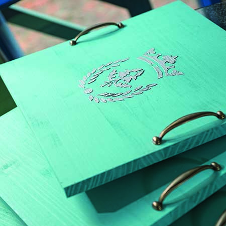 These simple wooden serving trays with handles have a relief design that you can customise to make your own beautiful trays for parties and celebrations.