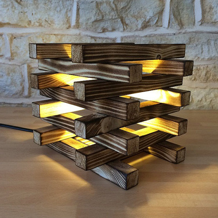 burnt and stacked wood desk or table lamp