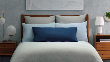 There's more than one way to style a bed using nothing more than a few affordable accessories.