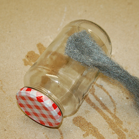 Leave on for about 10 seconds and then rub with steel wool. Soak in hot, soapy water and rub with a kitchen scouring sponge and dry. Your glass jars are now squeaky clean and ready to use.