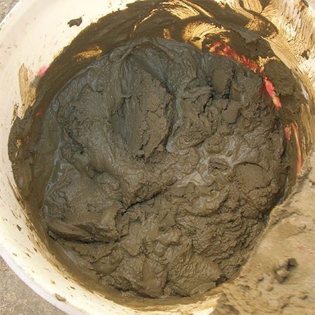 GOOD TO KNOW: Begin the plastering the wall while the PermaStop is still wet.