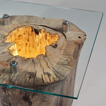 Using the natural beauty of timber, designers are crafting tables that draw a fine line between furniture and art