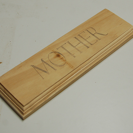 Again, we routed decorative edges to the board and transferred our wording onto the block.&nbsp;