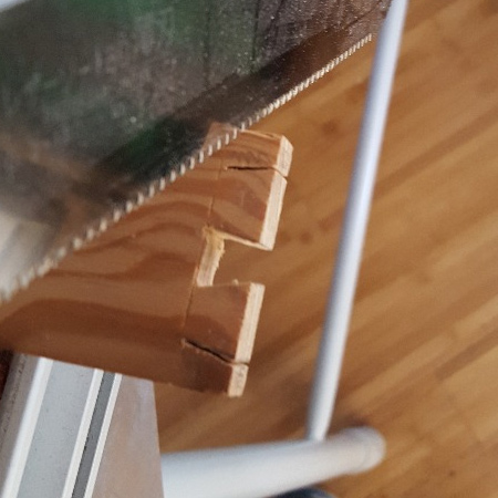 2. Mark the tails and pins on all corner sections. These need to be exactly equal on all pieces to ensure they fit together perfectly. Use a utility knife to score along the edge line
