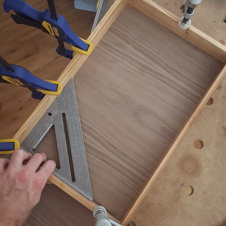 6.  A piece of walnut veneered plywood was glued in place for the base of the cutlery holder. Leave to dry and then trim away any excess.