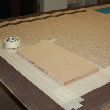 The rug will be used in my family room and I already have teal / turquoise in this room, so I thought it would be nice to incorporate some of this colour into the rug. I did this by adding a couple of squares using Rust-Oleum 2X satin in lagoon.&nbsp;