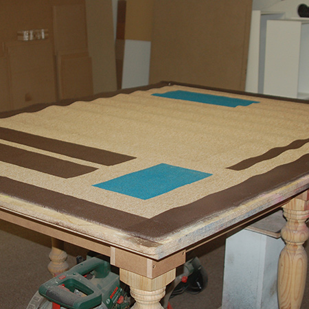 The finished rug after using Rust-Oleum 2X in satin espresso and lagoon
