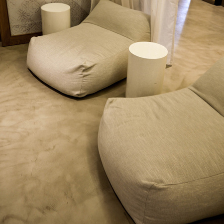 Cementitious, or cement-based, products are hand applied by trained contractors. What adds to the unique aspect of this product is that each hand has its own technique and character. You will seldom get an identical finish - even from the exact same hand.