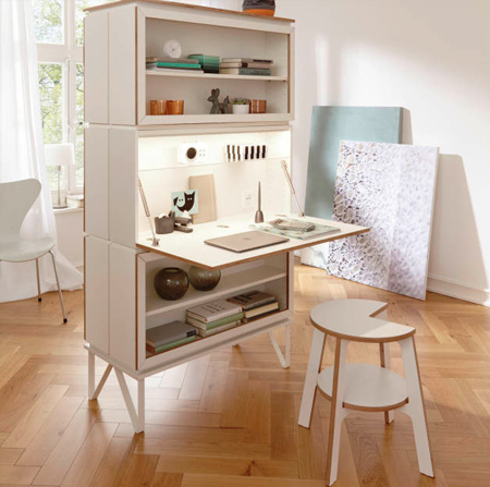 have decorative storage on one side and a practical work space on the other