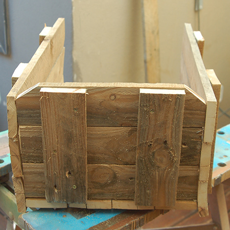 Reclaimed pallet wheelbarrow for plants or veggies
