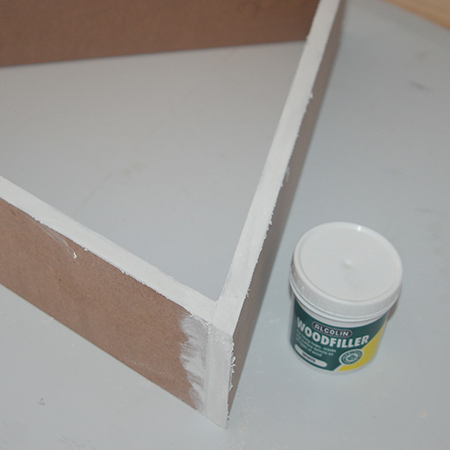 Triangular shelf for festive decor