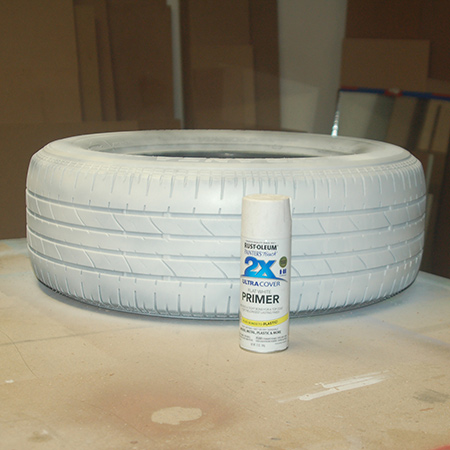Tyre ottoman with jeans fabric seat