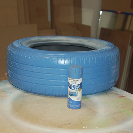 Tyre ottoman with jeans fabric seat