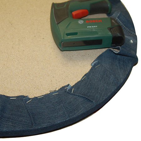 Tyre ottoman with jeans fabric seat