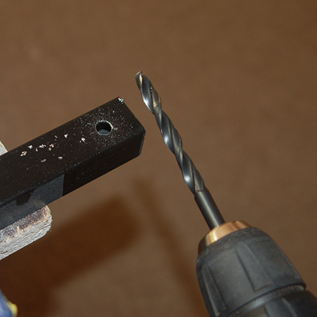 Use a quality HSS bit for drilling holes. These might cost more upfront, but not only will they last longer than cheaper bits, they also make drilling through steel quick and easy