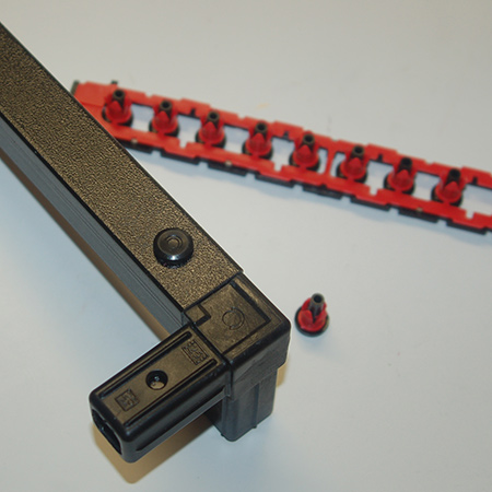 6. Now insert the Connect-it black pin and tap down. The lock pins hold the connectors and tube firmly