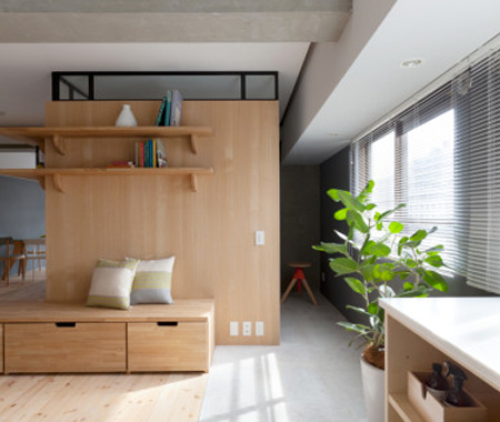  A basic timber frame is wrapped with plywood boards to have a partition that is sturdy yet attractive. 