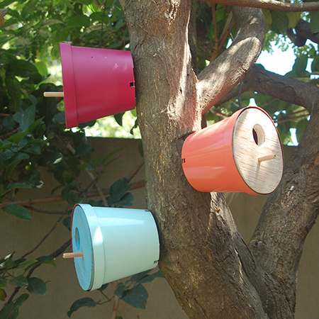 Rust-Oleum supplied me with a selection of new products and 2X spray colours to try out. I decided to make some colourful plant pot bird houses for the garden. This is a busy corner and I'm sure the local wildlife will appreciate the new housing development!