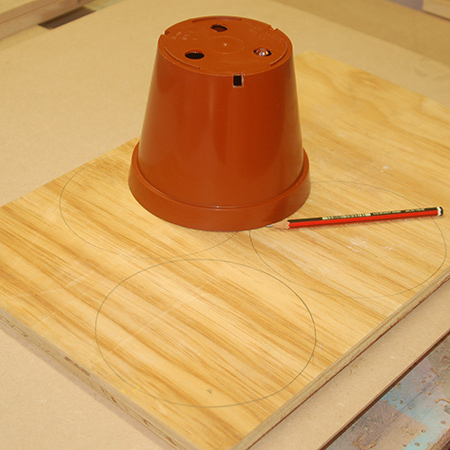 Place a pot on the plywood