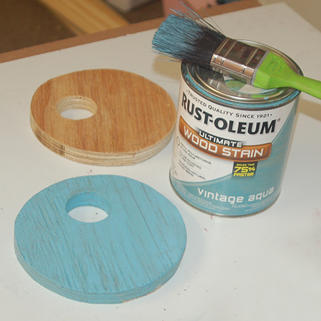 use a paintbrush to apply the stain